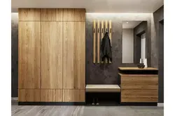 Hallway in a modern style with a wardrobe and a soft seat photo