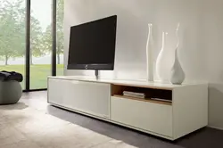 Long TV stand in a modern style for the living room photo
