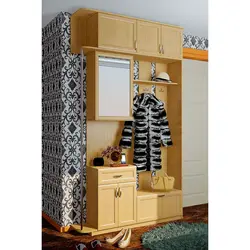 Hallway closet with shoe rack, hanger and seat photo