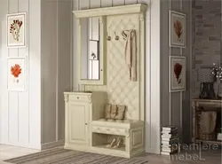 Hallway closet with shoe rack, hanger and seat photo