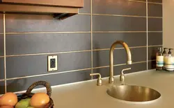 Латунь в интерьере кухни