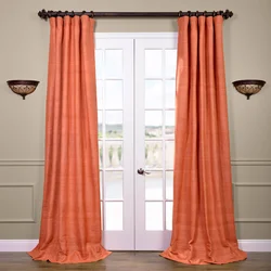 Terracotta curtains in the bedroom interior