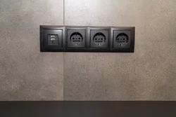 Black sockets in the bedroom interior