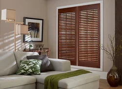 Wooden blinds in the living room interior