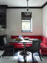 Black sofa in the kitchen interior