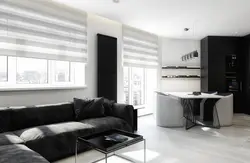 Black sofa in the kitchen interior