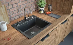 Gray sink in the kitchen interior