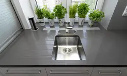 Gray sink in the kitchen interior
