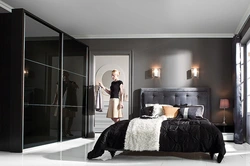 Black Wardrobe In The Bedroom Interior