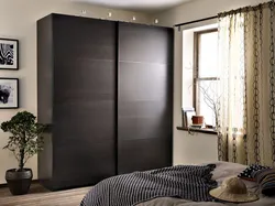 Black Wardrobe In The Bedroom Interior