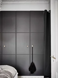 Black Wardrobe In The Bedroom Interior