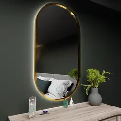 Oval mirror in the bathroom interior