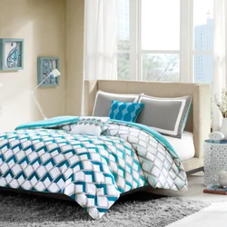 Turquoise Bedspread In The Bedroom Interior