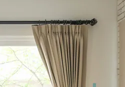 Black cornice in the kitchen interior