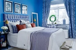 Bedroom interior with blue bedspread