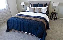 Bedroom interior with blue bedspread