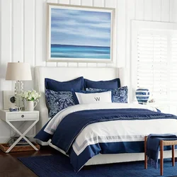 Bedroom interior with blue bedspread