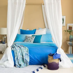 Bedroom interior with blue bedspread
