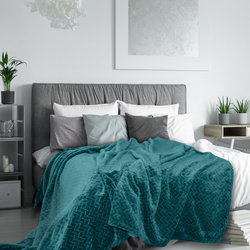 Bedroom interior with blue bedspread