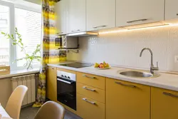 Yellow apron in the kitchen interior