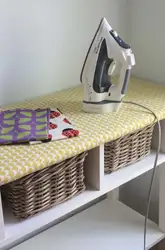 Ironing board in the bedroom interior