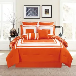 Orange bed in the bedroom interior