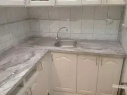 Ас үй интерьеріндегі паладин үстелі