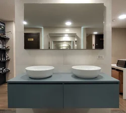 Black cabinet in the bathroom interior