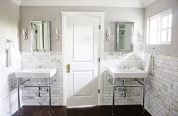 White door in the bathroom interior