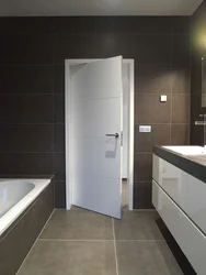 White Door In The Bathroom Interior