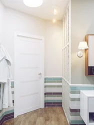 White door in the bathroom interior