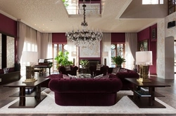 Burgundy sofa in the kitchen interior