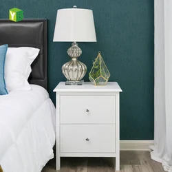 White nightstands in the bedroom interior