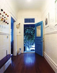 Blue door in the hallway interior