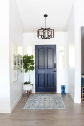 Blue door in the hallway interior