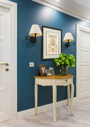 Blue door in the hallway interior