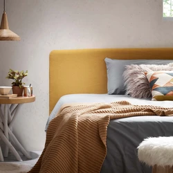 Mustard bed in the bedroom interior