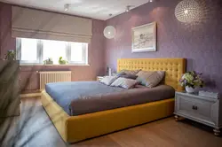 Mustard bed in the bedroom interior