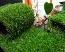 Artificial grass in the bathroom interior