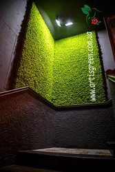 Artificial grass in the bathroom interior