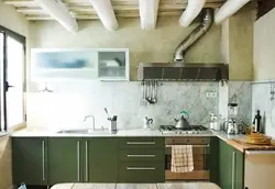 Green loft kitchen in the interior
