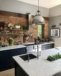 Green loft kitchen in the interior