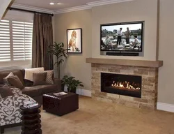 Narrow fireplace in the living room interior