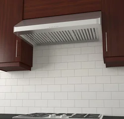 Flat hood in the kitchen interior