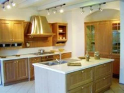 Beige hood in the kitchen interior