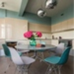 Turquoise chairs for the kitchen in the interior