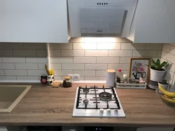 Beige hob in the kitchen interior