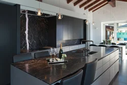 Giallo marble countertop in the kitchen interior