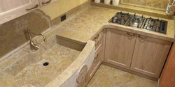 Giallo marble countertop in the kitchen interior