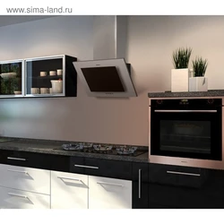 Glass hood for the kitchen in the interior